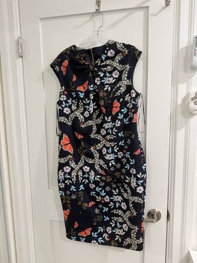 Ted Baker navy blue floral / butterfly sleeveless dress (fits size 10-12) (fair)